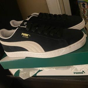 Brand new size 6.5 C Suede Pumas